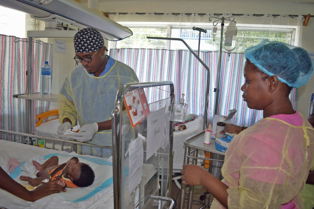 Doctors checking a patient