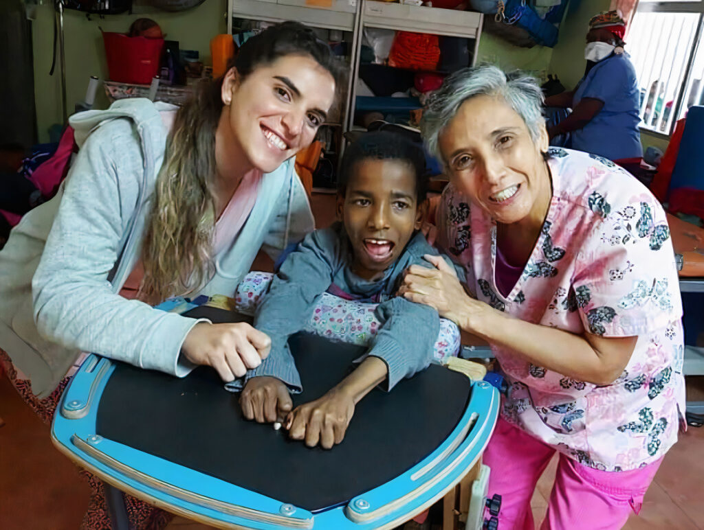 Flor with a patient and colleague